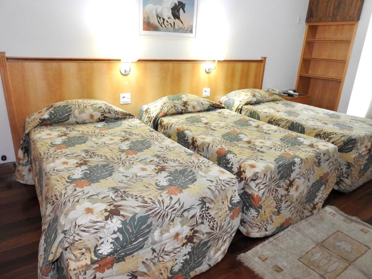 Constantino Hotel E Eventos Juiz de Fora Bagian luar foto A room at the hotel