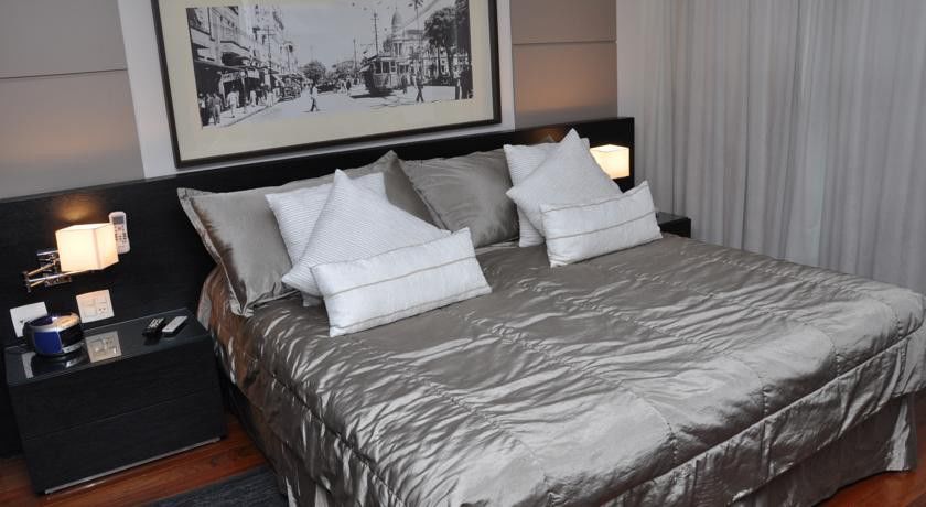 Constantino Hotel E Eventos Juiz de Fora Bagian luar foto A bed with a duvet